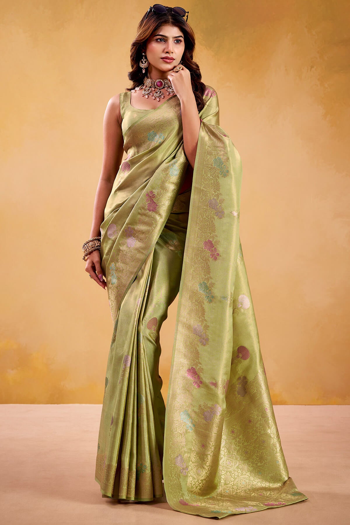 Snappy Green Banarasi Tissue Silk Saree With Eye-catching Blouse Piece