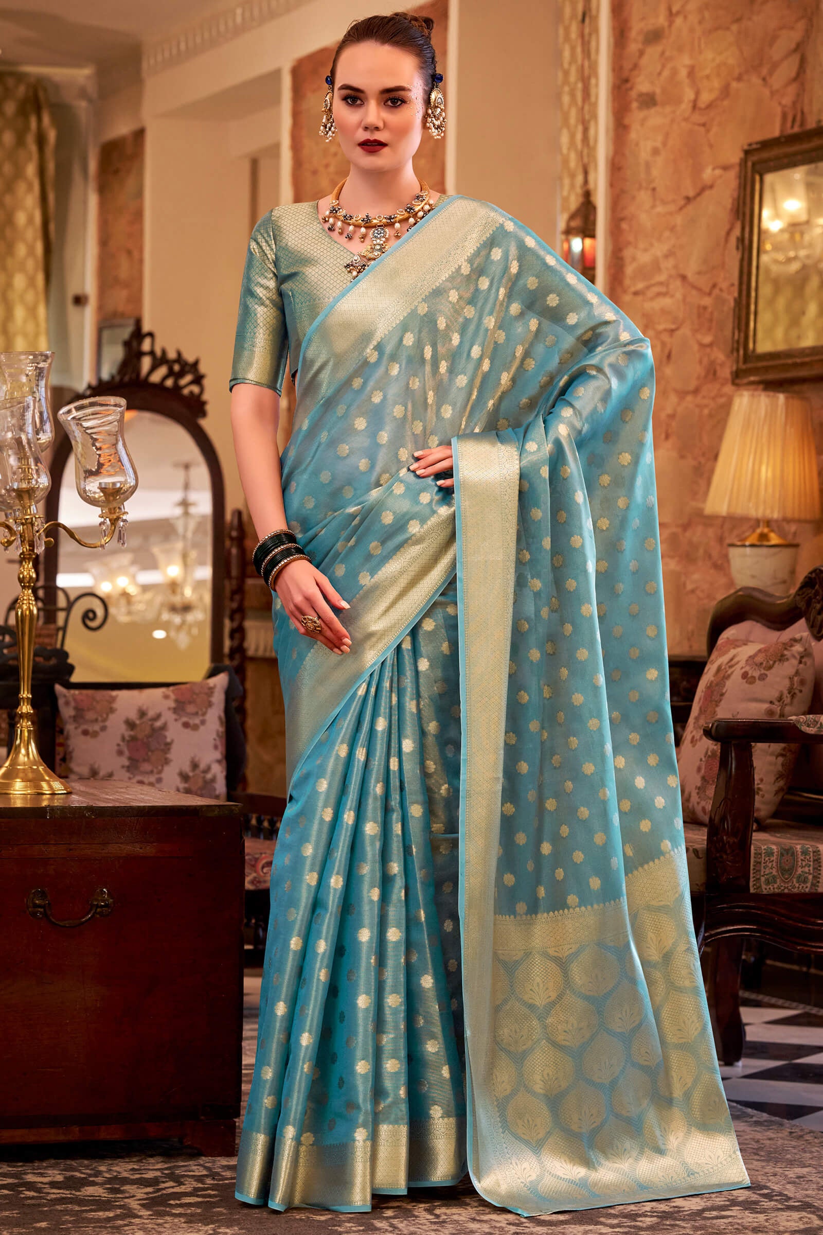 Forbearance Firozi Soft Banarasi Tissue Silk Saree With Vestigial Blouse Piece