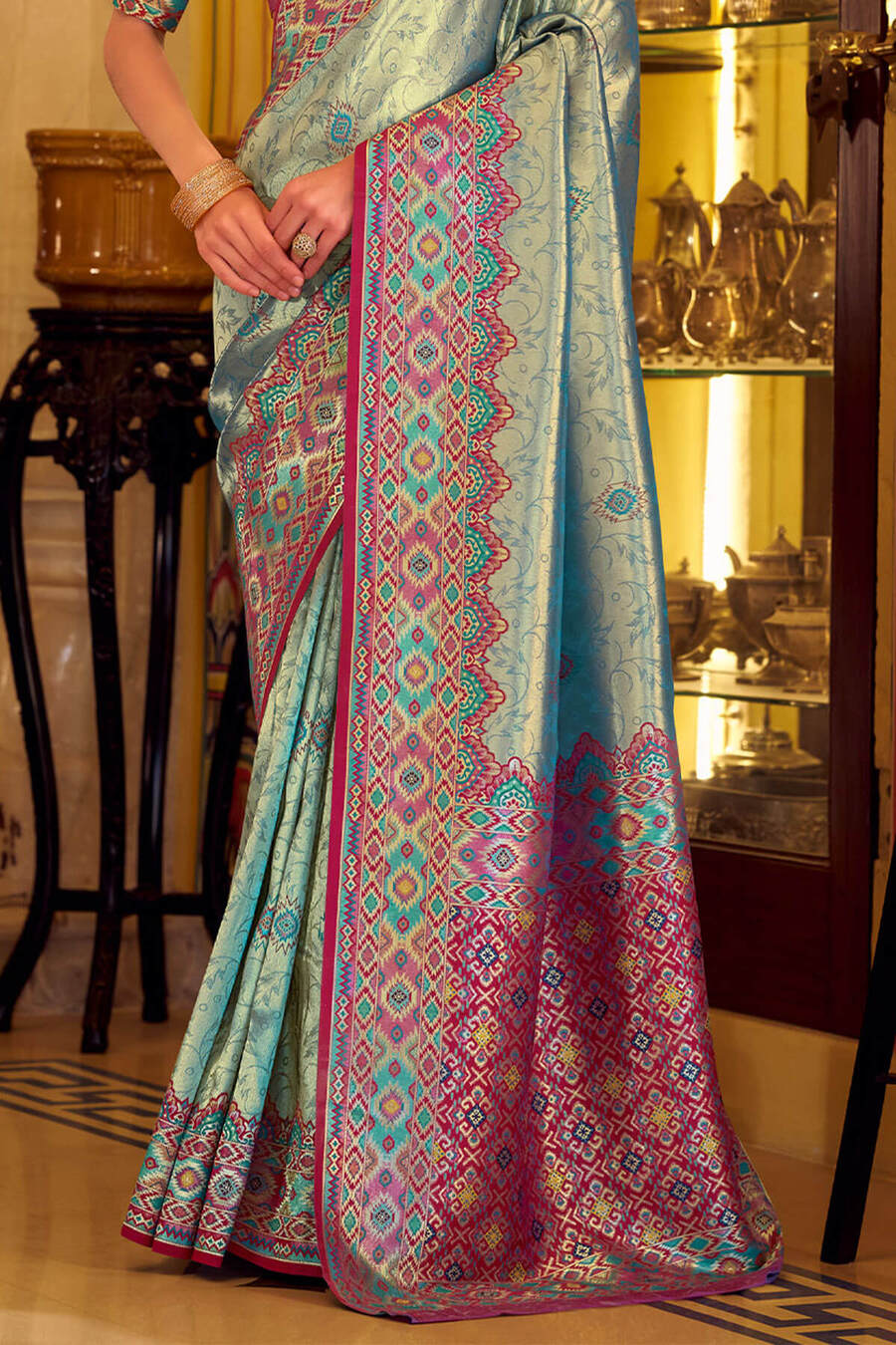 Ethnic Rama Tissue Patola Silk Saree with Enticing Blouse Piece