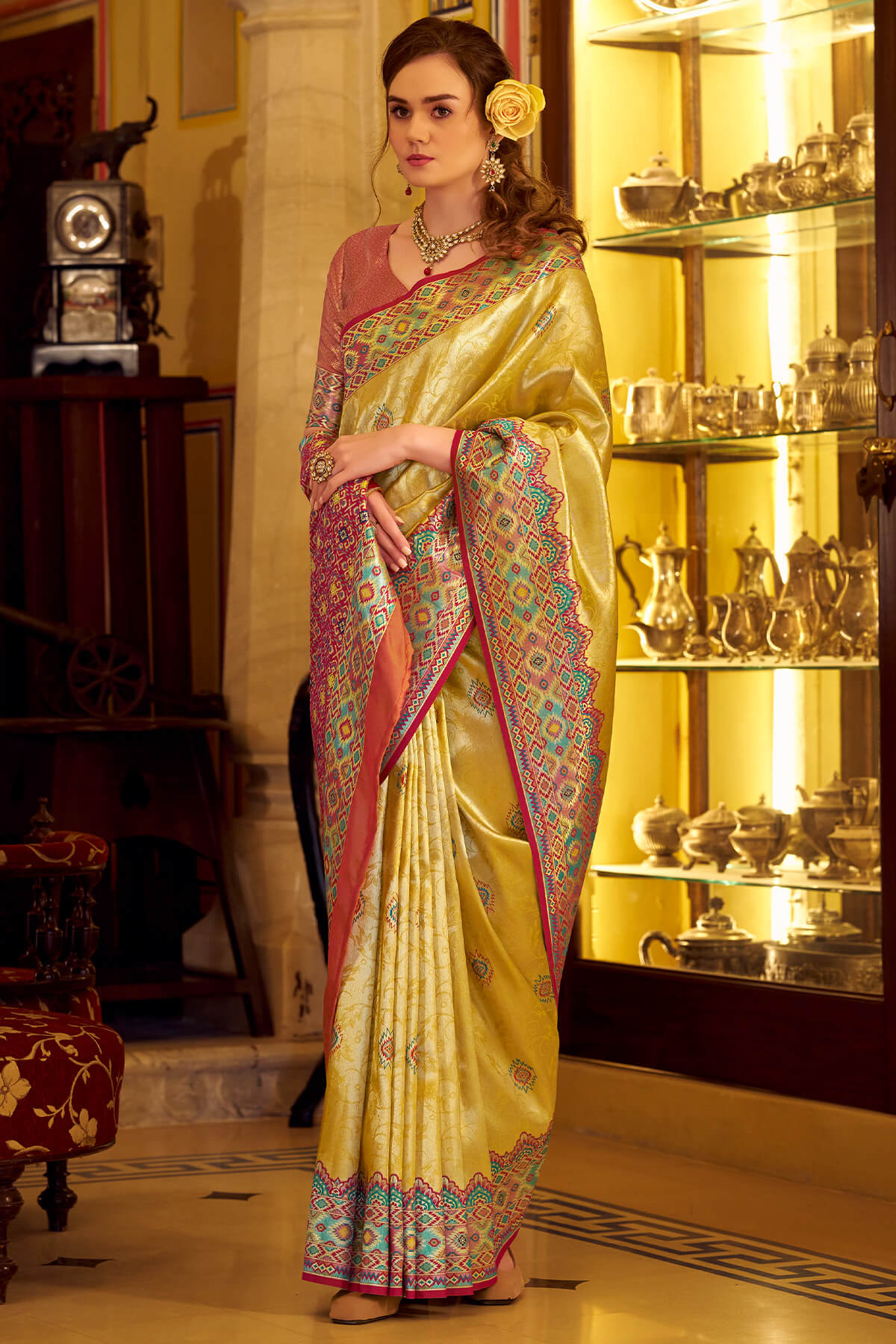 Fragrant Yellow Tissue Patola Silk Saree with Trendy Blouse Piece