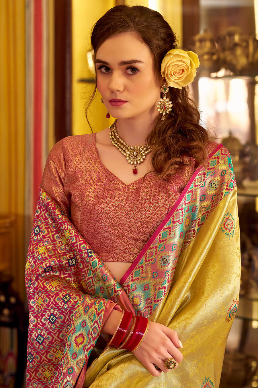 Fragrant Yellow Tissue Patola Silk Saree with Trendy Blouse Piece