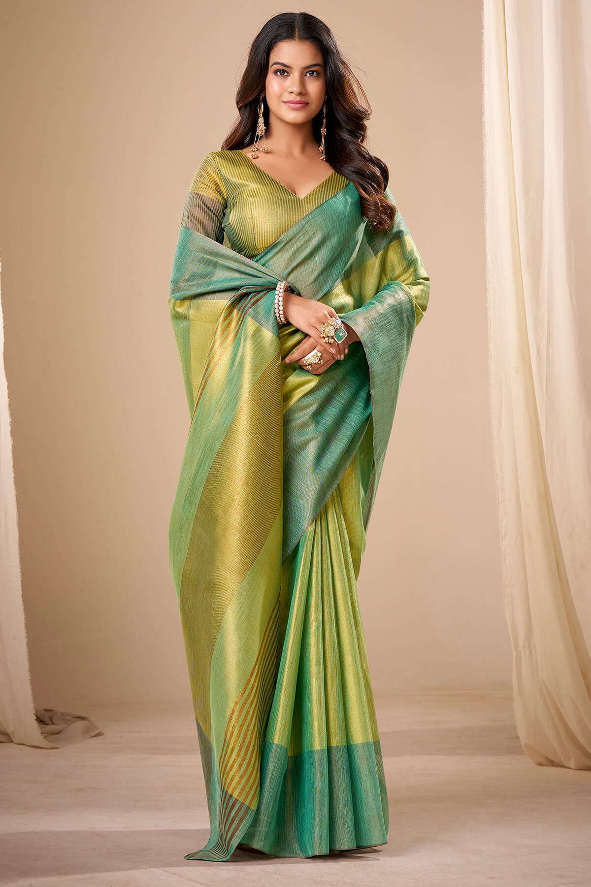 Murmurous Green Banarasi Tissue Silk Saree With Sonorous Blouse Piece