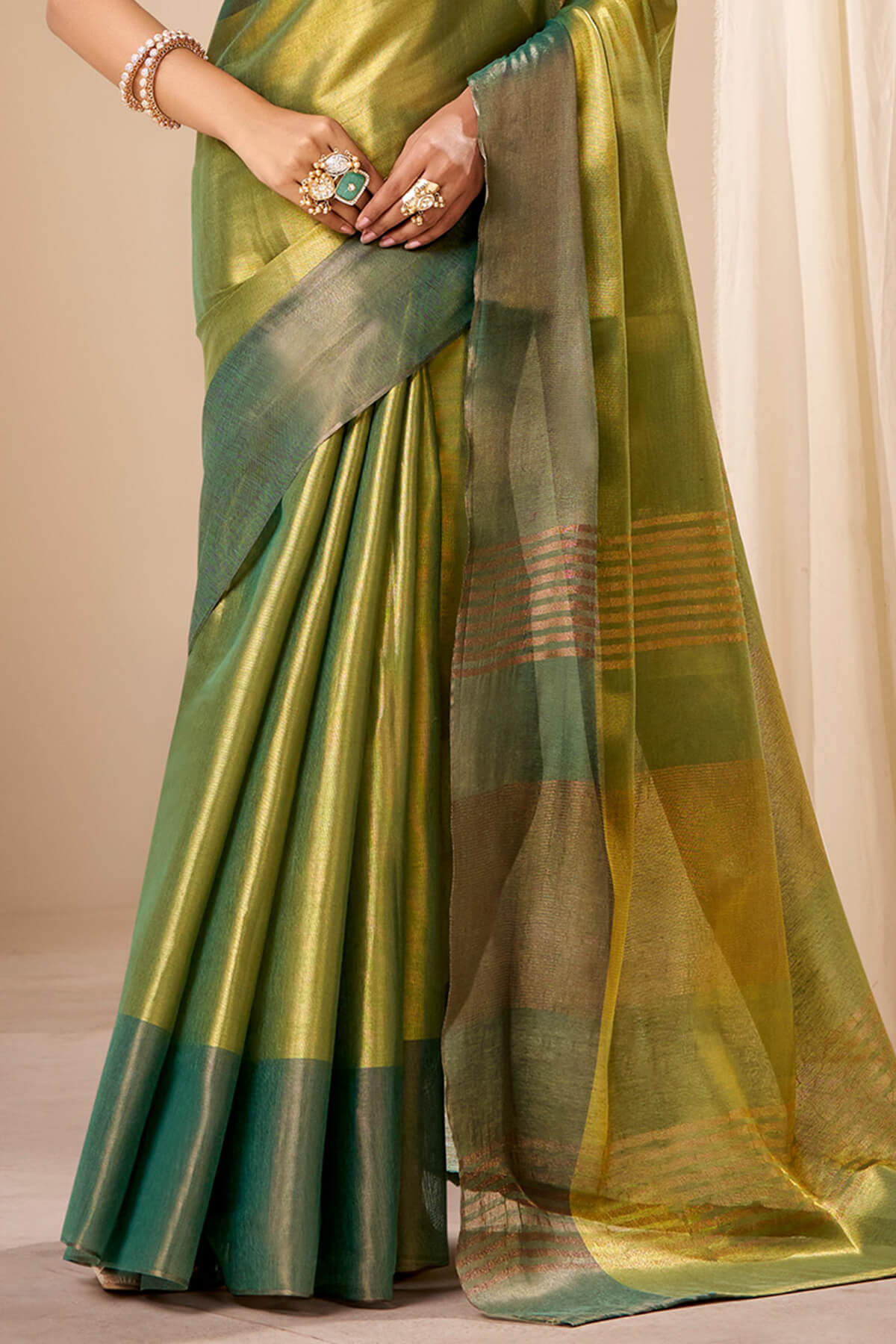 Zephyr Dark Green Banarasi Tissue Silk Saree With Exemplary Blouse Piece