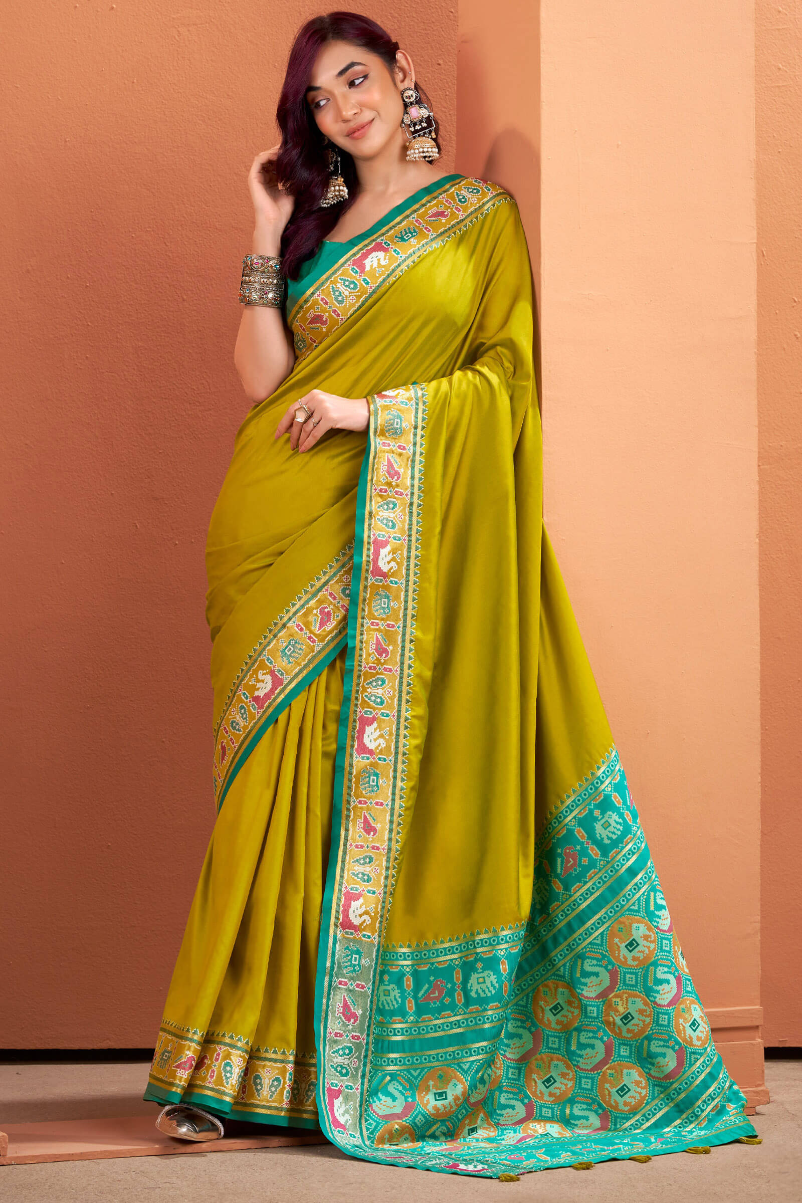Designer Mustard Patola Silk Saree with Entrancing Blouse Piece
