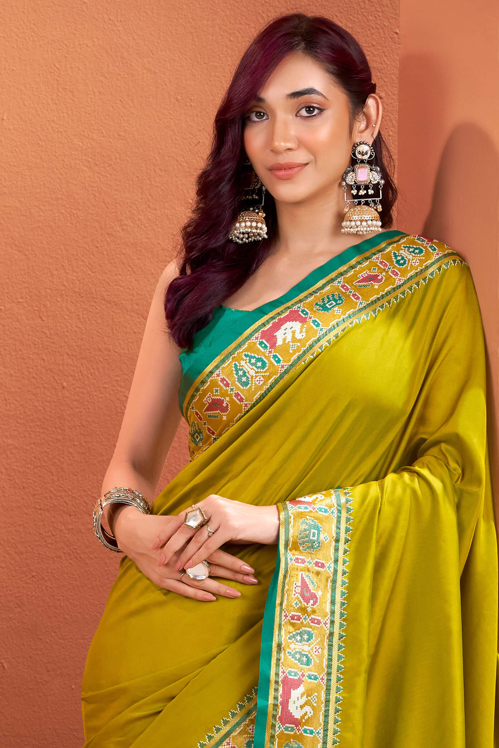 Designer Mustard Patola Silk Saree with Entrancing Blouse Piece