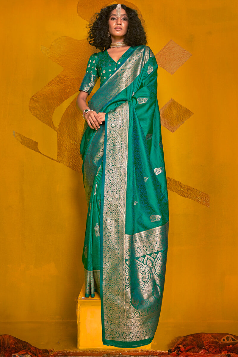 Eloquence Dark Green Soft Banarasi Silk Saree With Propinquity Blouse Piece