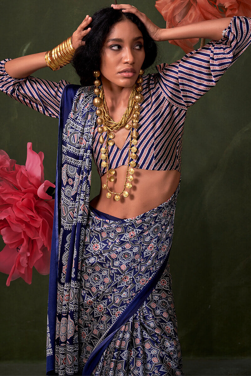 Appealing Navy Blue Ajrakh Printed Satin Silk Saree With Susurrous Blouse Piece