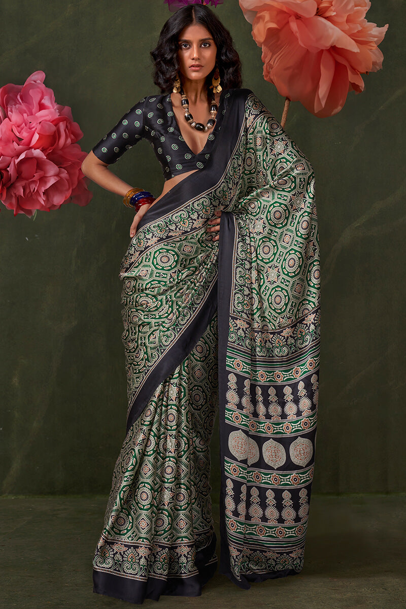 Glamorous Green Ajrakh Printed Satin Silk Saree With Cynosure Blouse Piece
