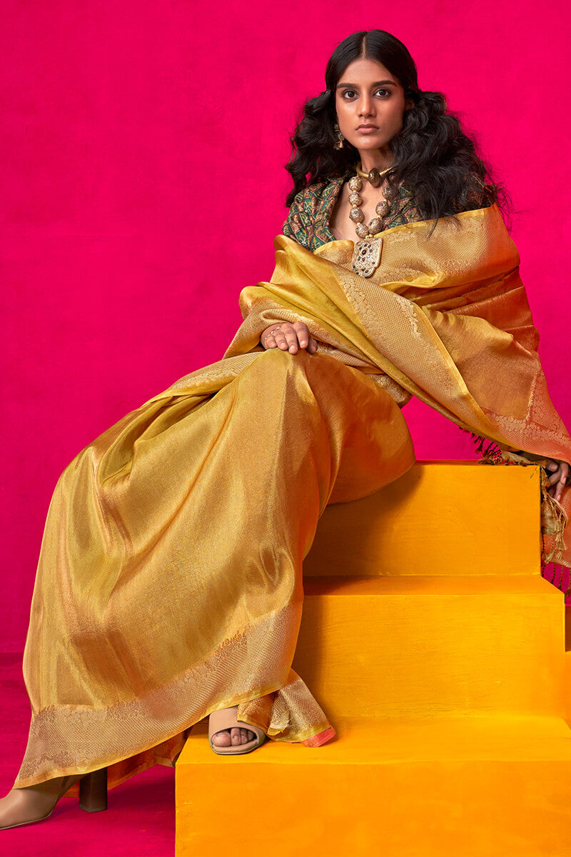 Engrossing Yellow Soft Banarasi Tissue Silk Saree With Scintilla Blouse Piece