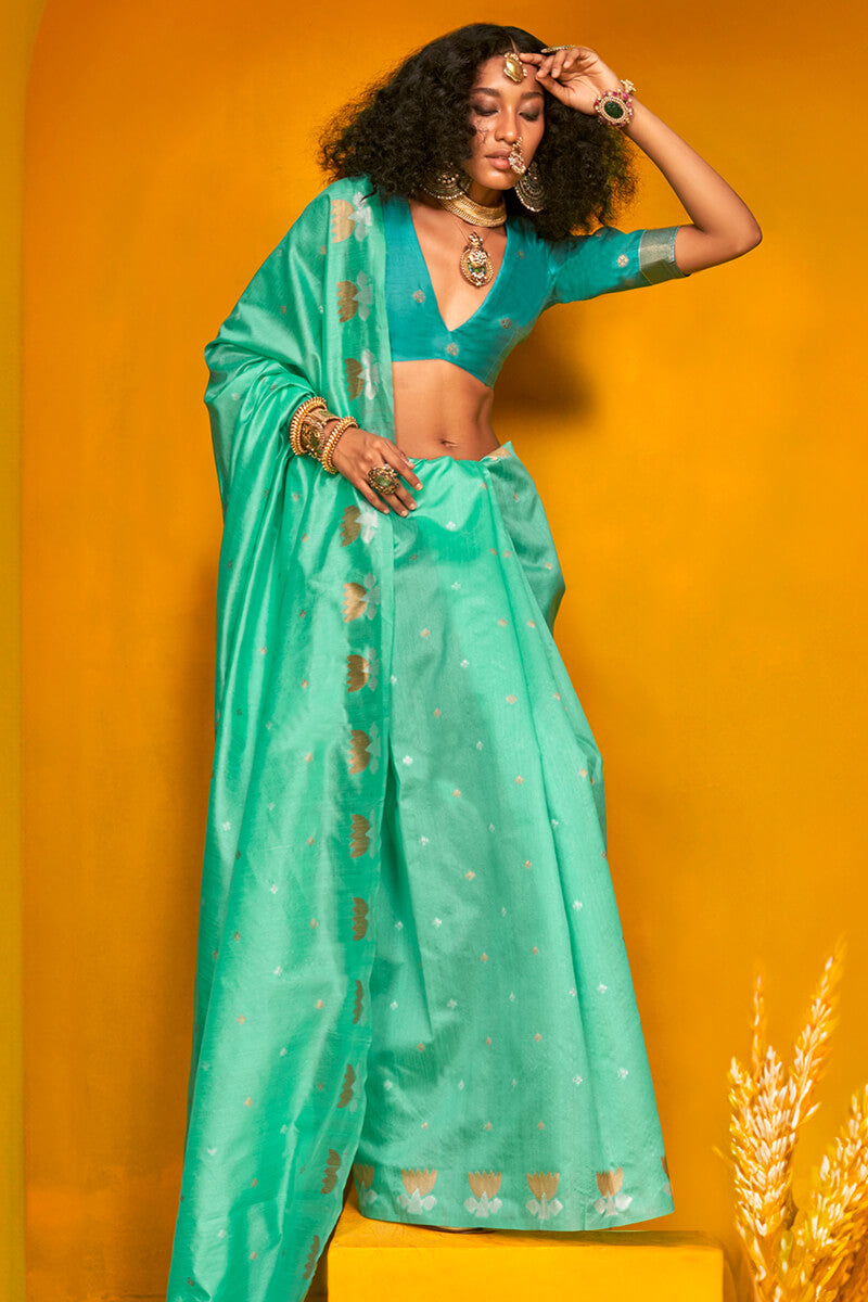 Assemblage Turquoise Soft Banarasi Silk Saree With Epiphany Blouse Piece