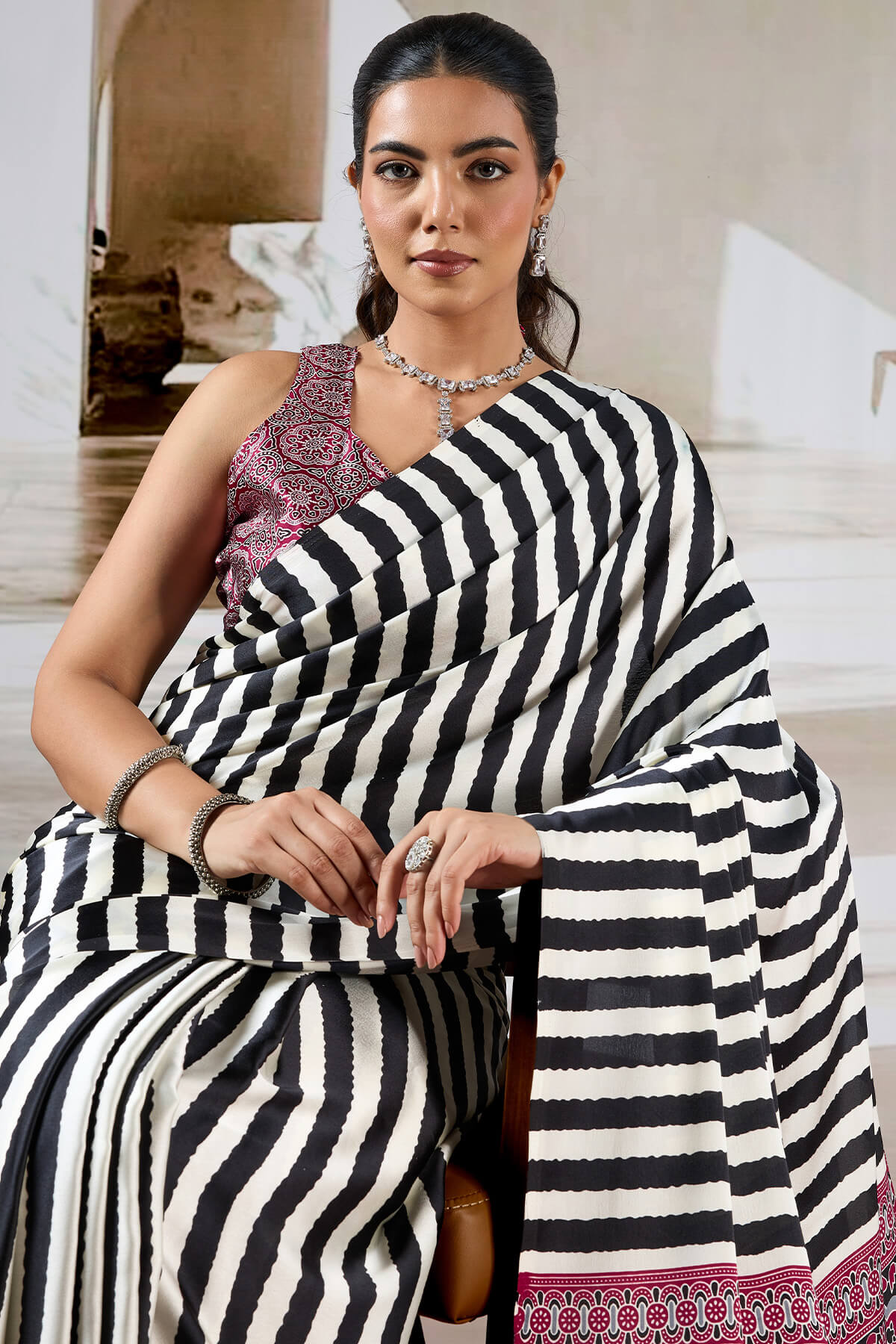 Splendiferous Black Ajrakh Printed Satin Silk Saree With Smashing Blouse Piece