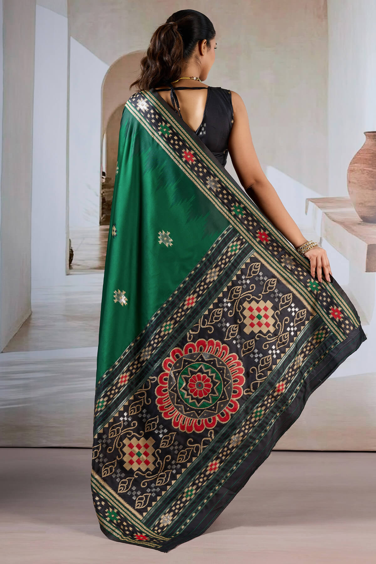 Seraphic Dark Green Patola Silk Saree with Extraordinary Blouse Piece