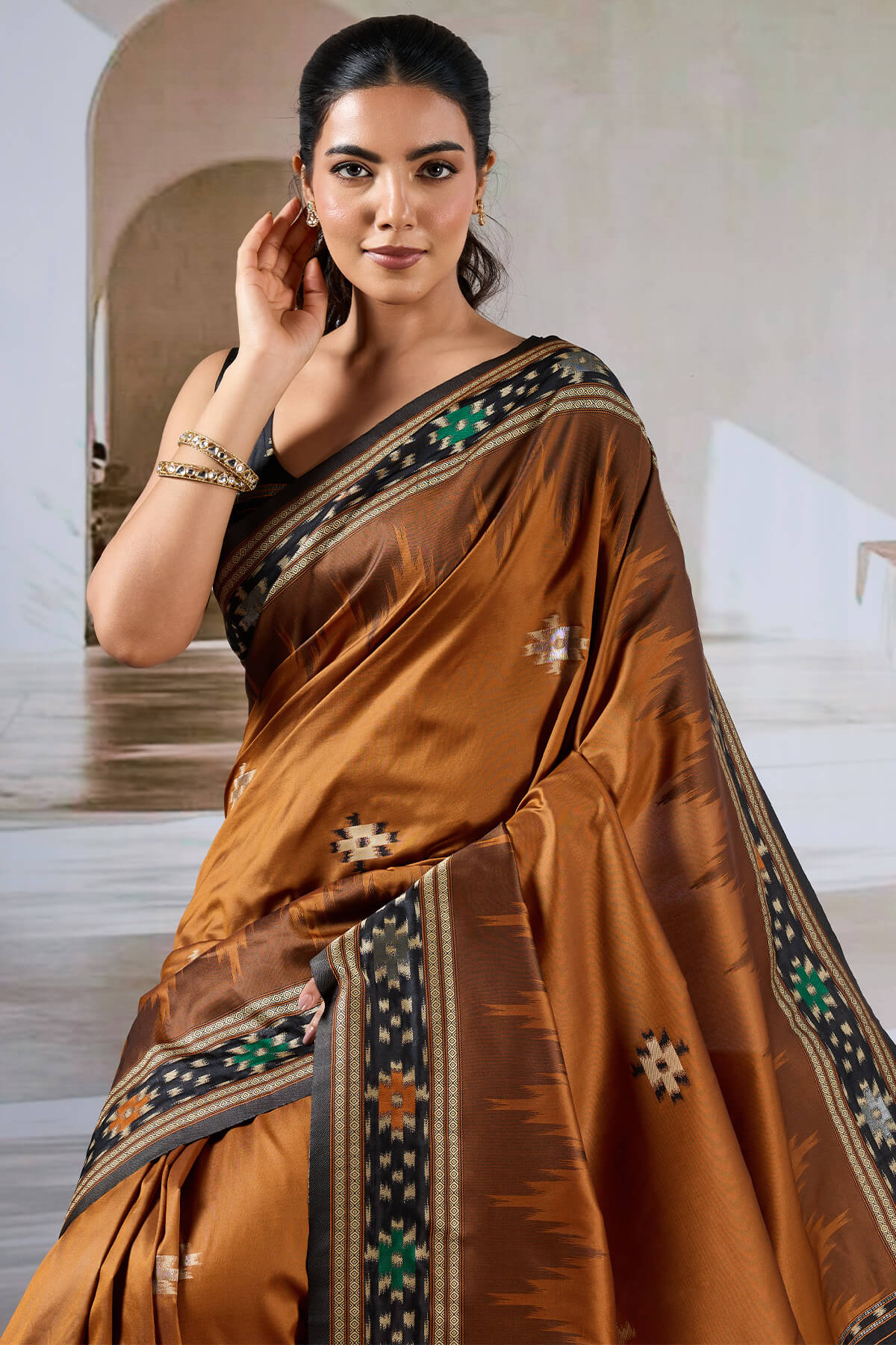 Vivacious Brown Patola Silk Saree with Excellent Blouse Piece