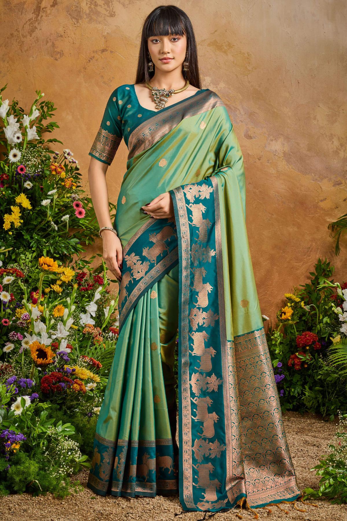 Fugacious Green Soft Banarasi Silk Saree With Unique Blouse Piece