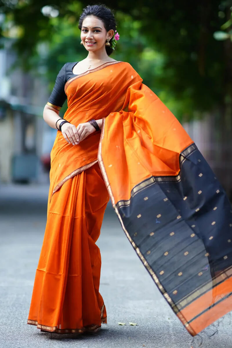 Enigmatic Orange Cotton Silk Saree With Panache Blouse Piece