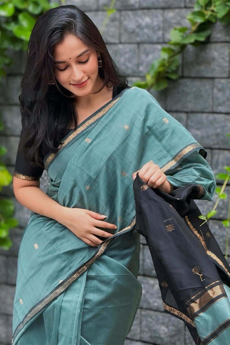 Classy Sea Green Cotton Silk Saree With Gratifying Blouse Piece