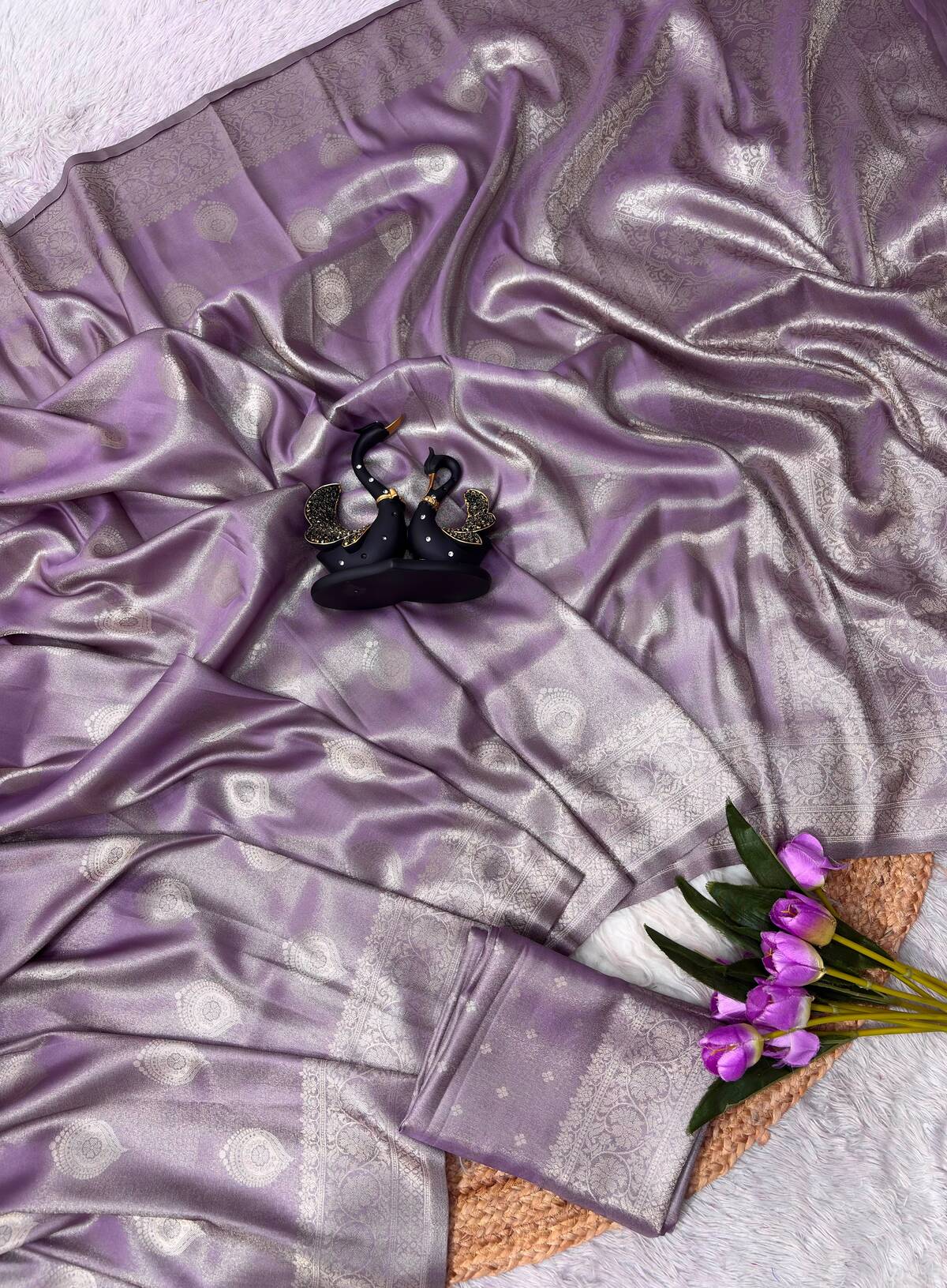 Scintillating Lavender Banarasi Tissue Silk Saree With Cynosure Blouse Piece