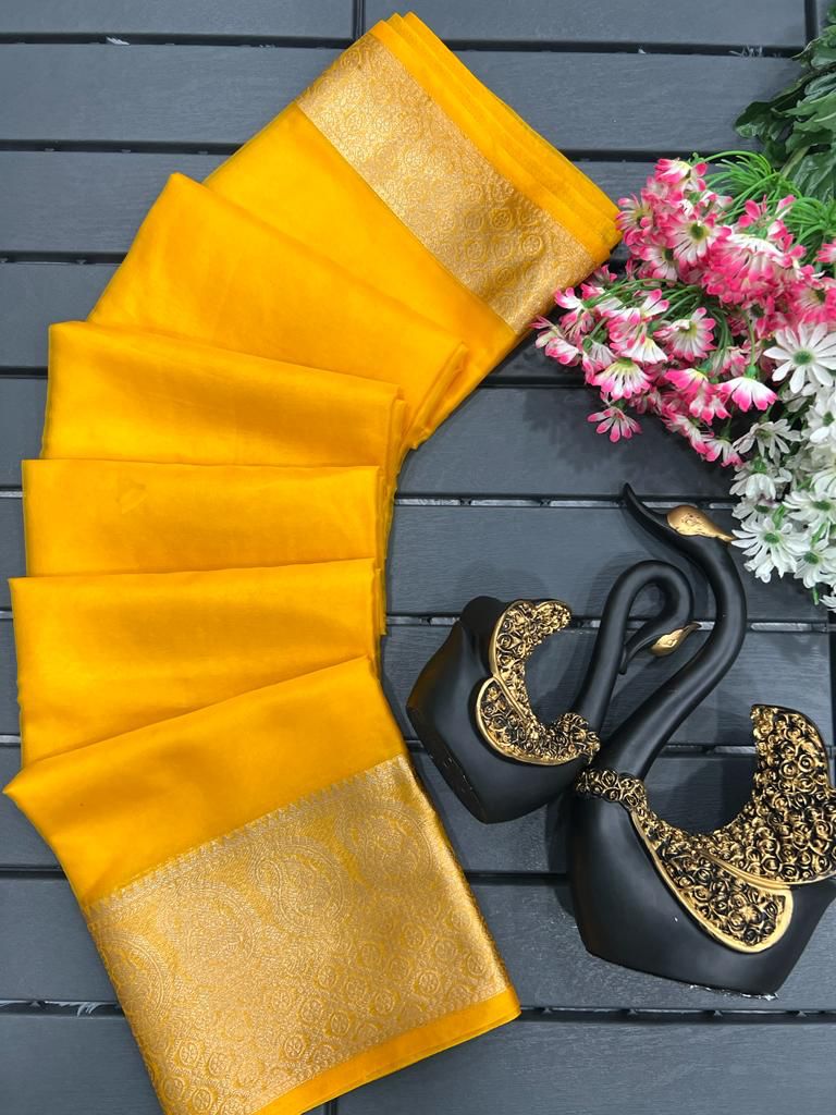 Scrumptious Yellow Organza Silk Saree With Magnificat Blouse Piece