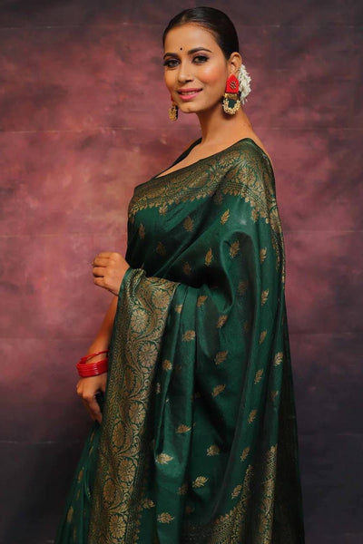 Adorning Dark Green Soft Silk Saree With Prominent Blouse Piece