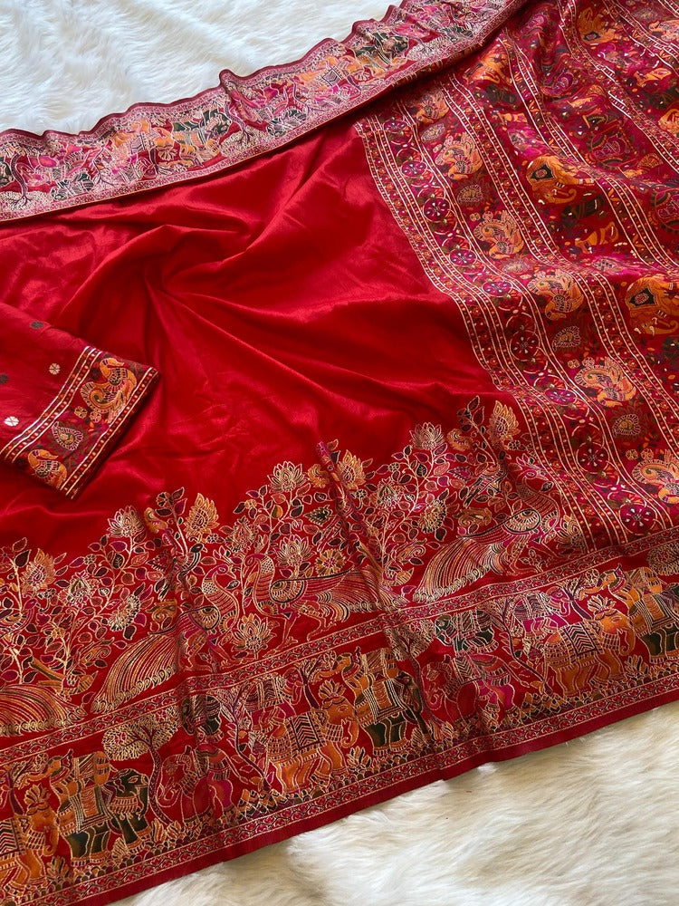 Tempting Red Pashmina Saree With Elaborate Blouse Piece