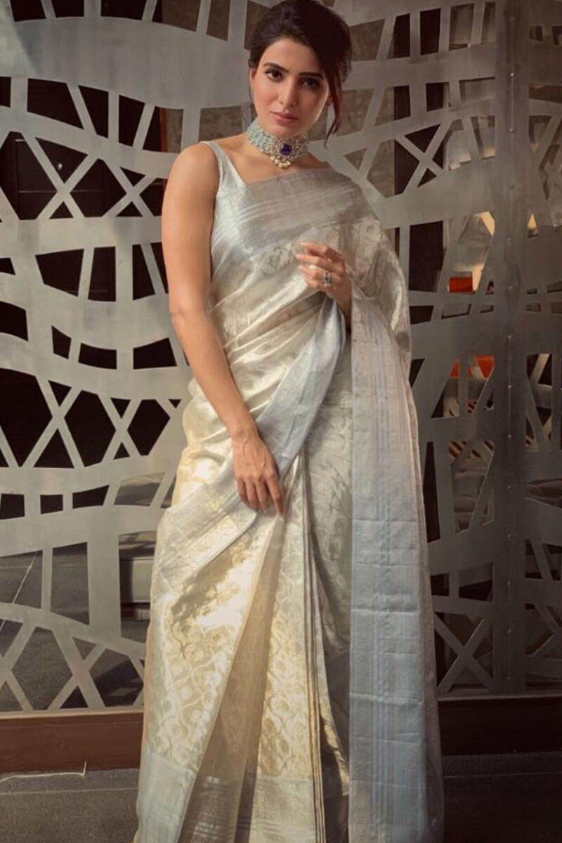 Bollywood Style Silver Soft Tissue Silk Saree With Winsome Blouse Piece