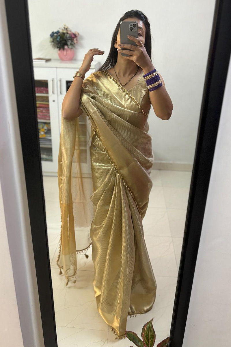 Fancifull Golden Soft Tissue Silk Saree With Demesne Blouse Piece