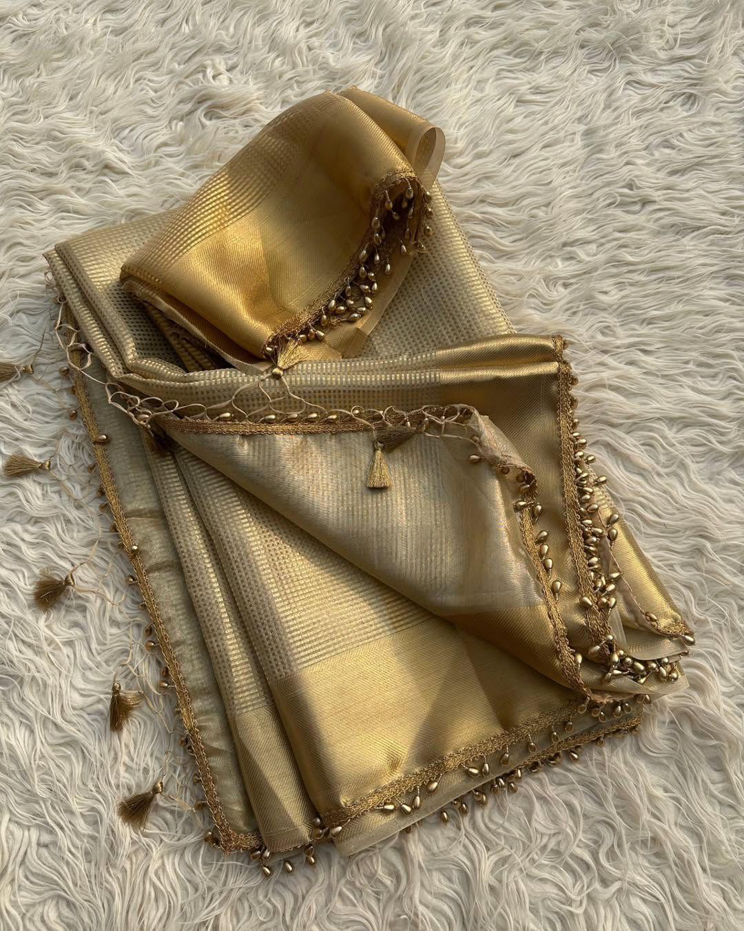 Fancifull Golden Soft Tissue Silk Saree With Demesne Blouse Piece