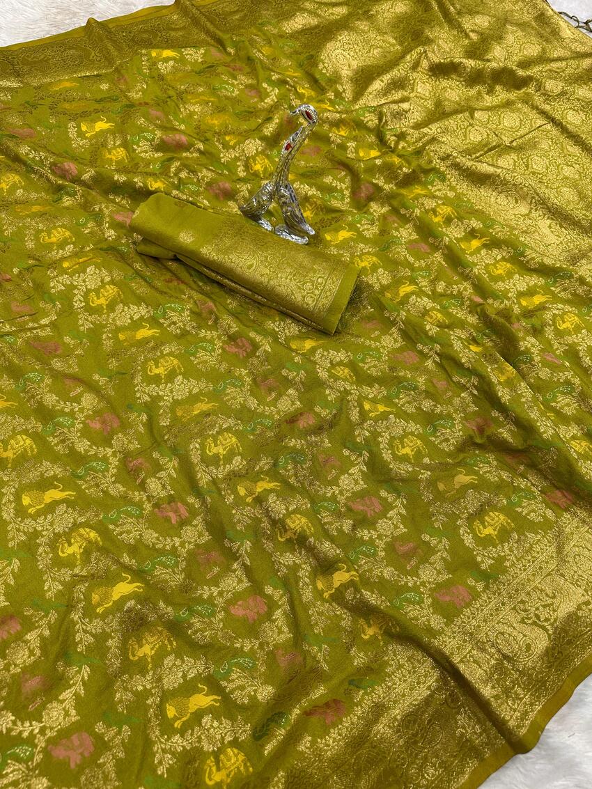 Cynosure Green Soft Banarasi Silk Saree With Precious Blouse Piece