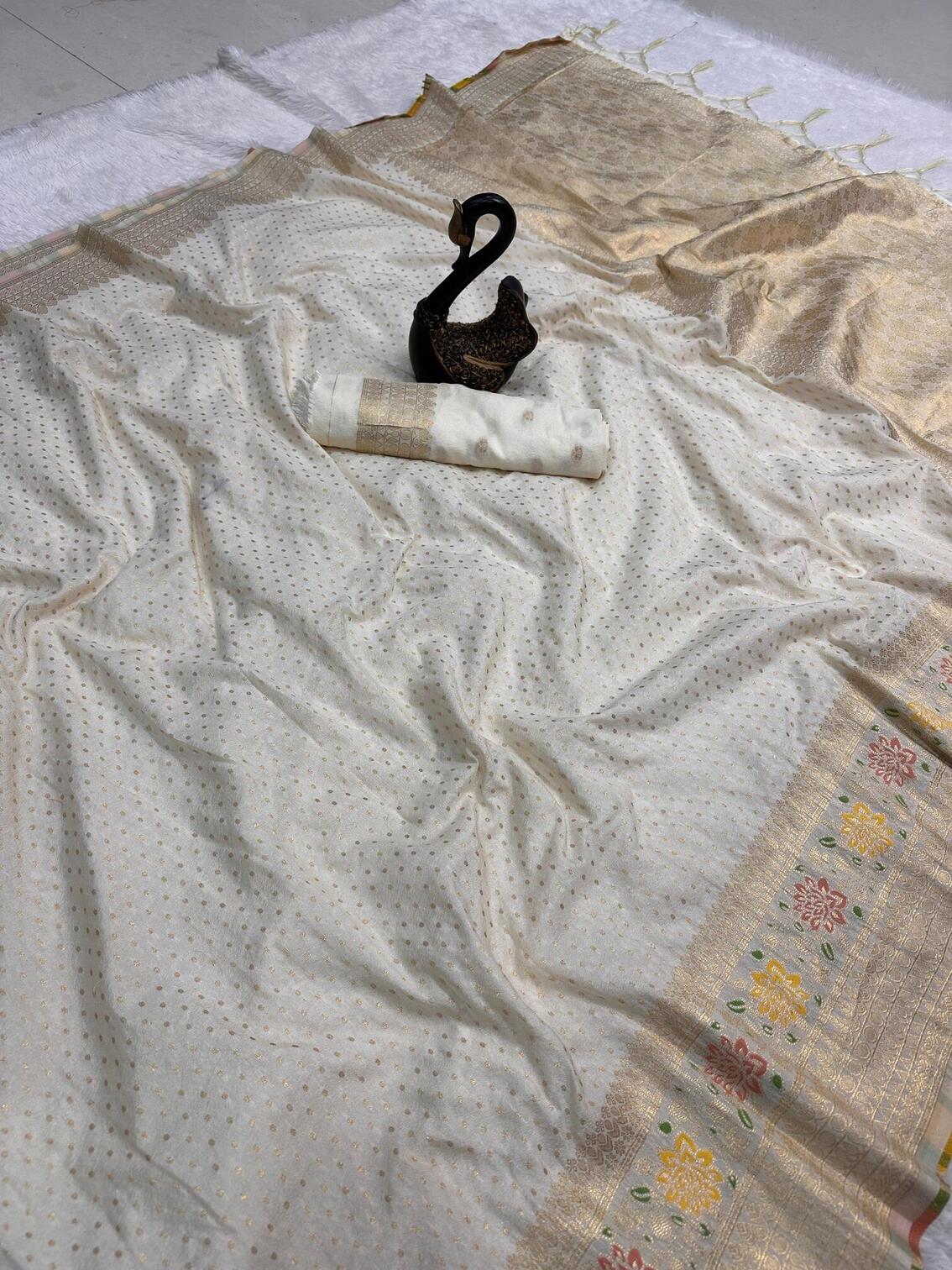 Beautiful Off White Soft Banarasi Silk Saree With Snazzy Blouse Piece