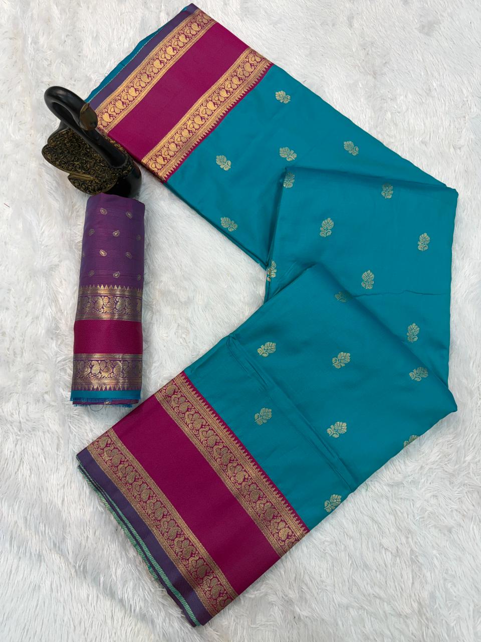 Lissome Firozi Soft Banarasi Kathpadar Silk Saree With Angelic Blouse Piece