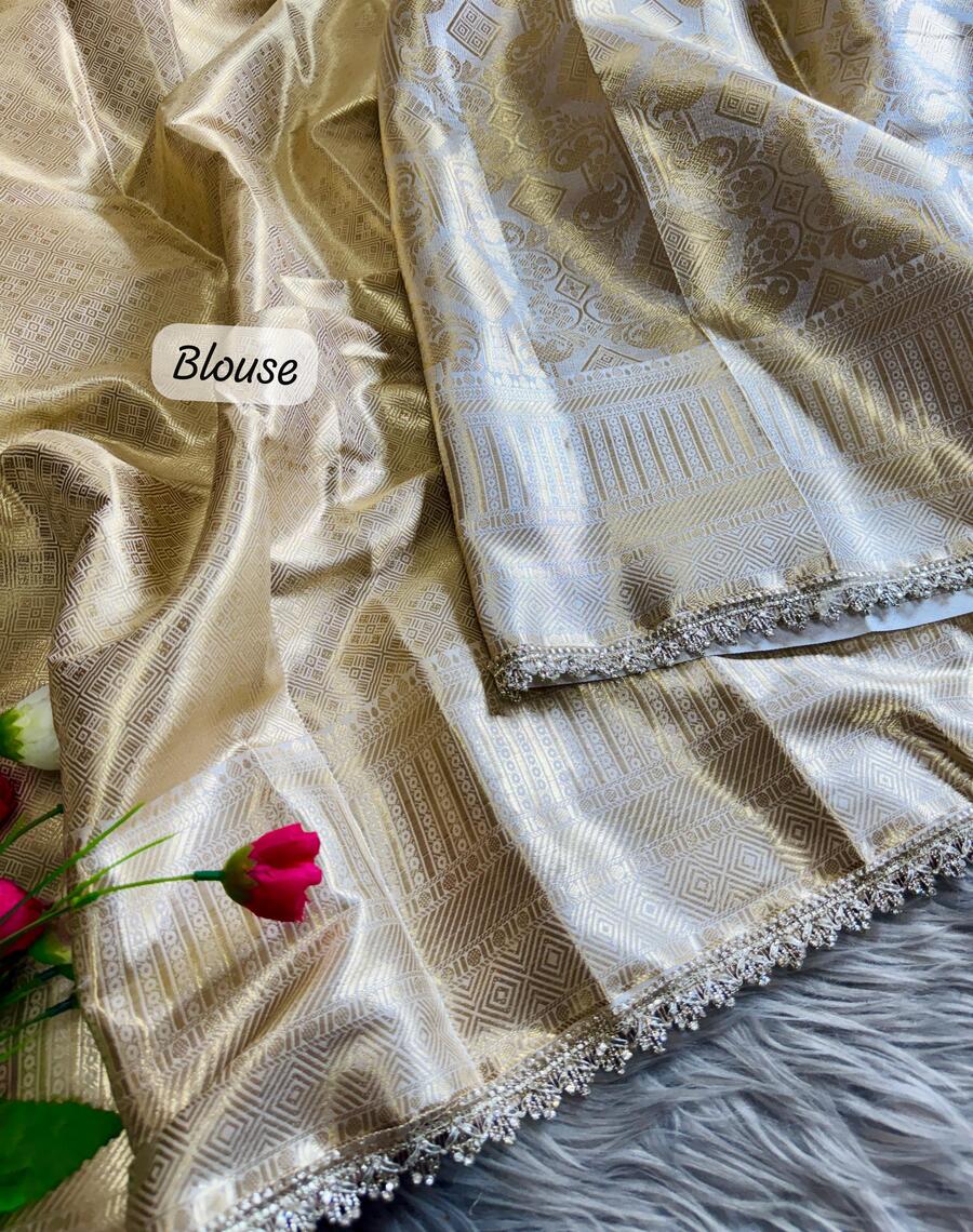 Fancifull Beige Soft Tissue Silk Saree With Classy Blouse Piece