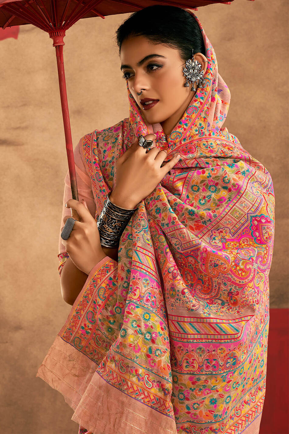 Delectable Peach Pashmina Saree With Panache Blouse Piece