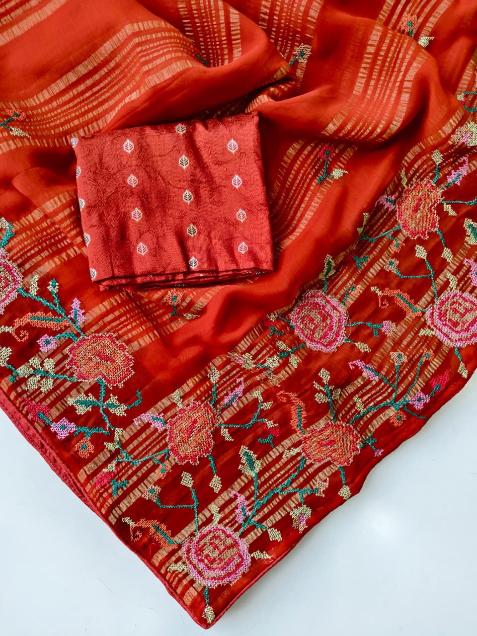 Efflorescence Red Embroidery Work Chiffon Silk Saree With Demure Blouse Piece