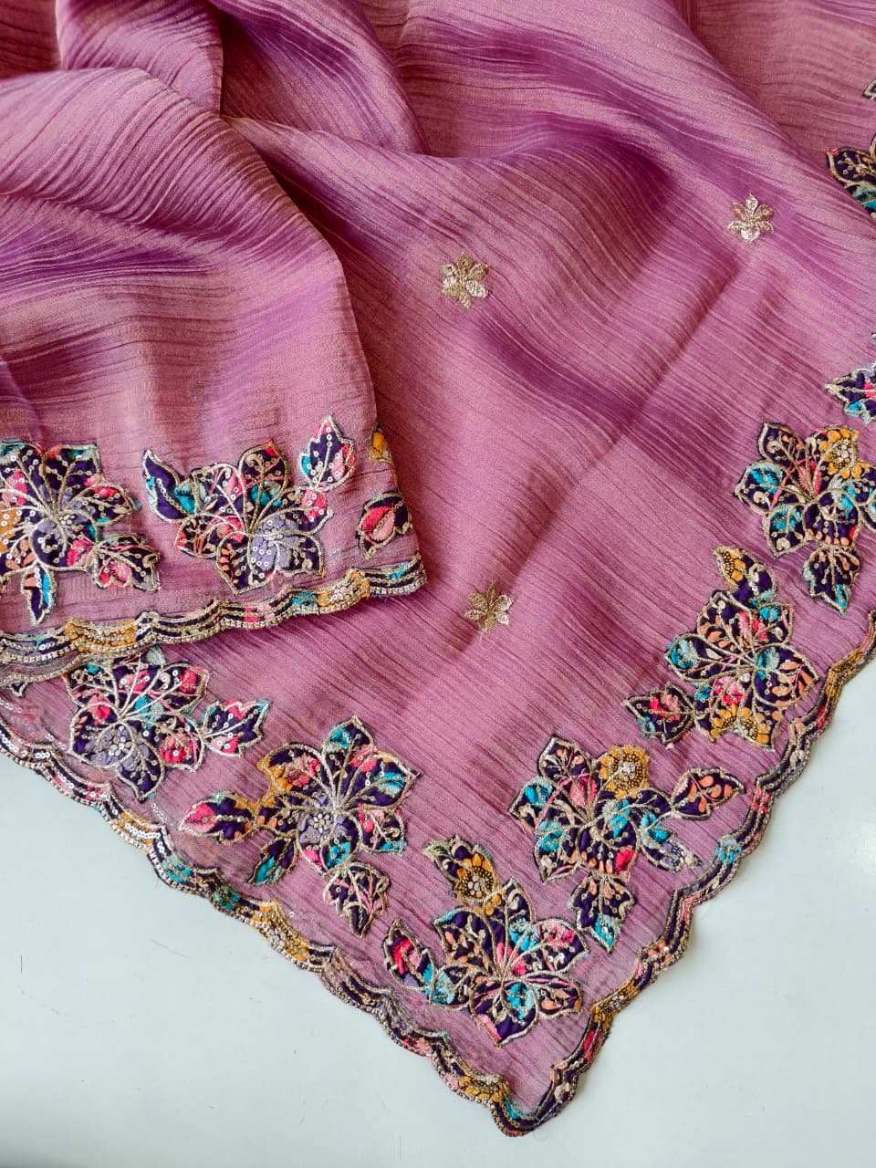 Luminous Pink Embroidery Work Crush Silk Saree With Cynosure Blouse Piece