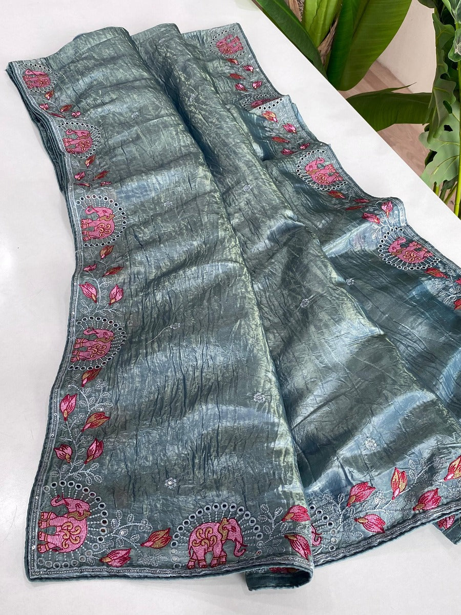 Symmetrical Teal Blue Embroidery Work Crush Silk Saree With Imaginative Blouse Piece