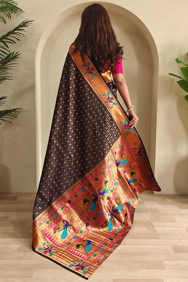 Redolent Black Paithani Silk Saree With Profuse Blouse Piece