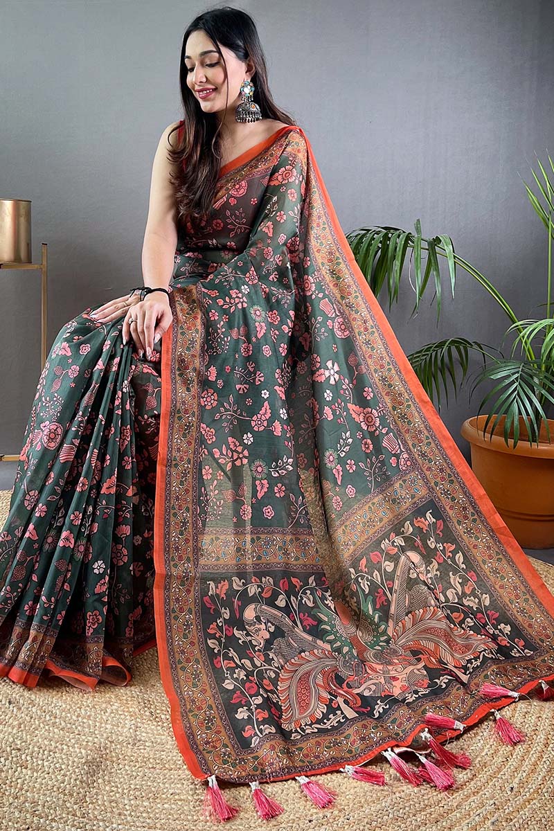 Lovely Dark Green Kalamkari Printed Saree With Gleaming Blouse Piece