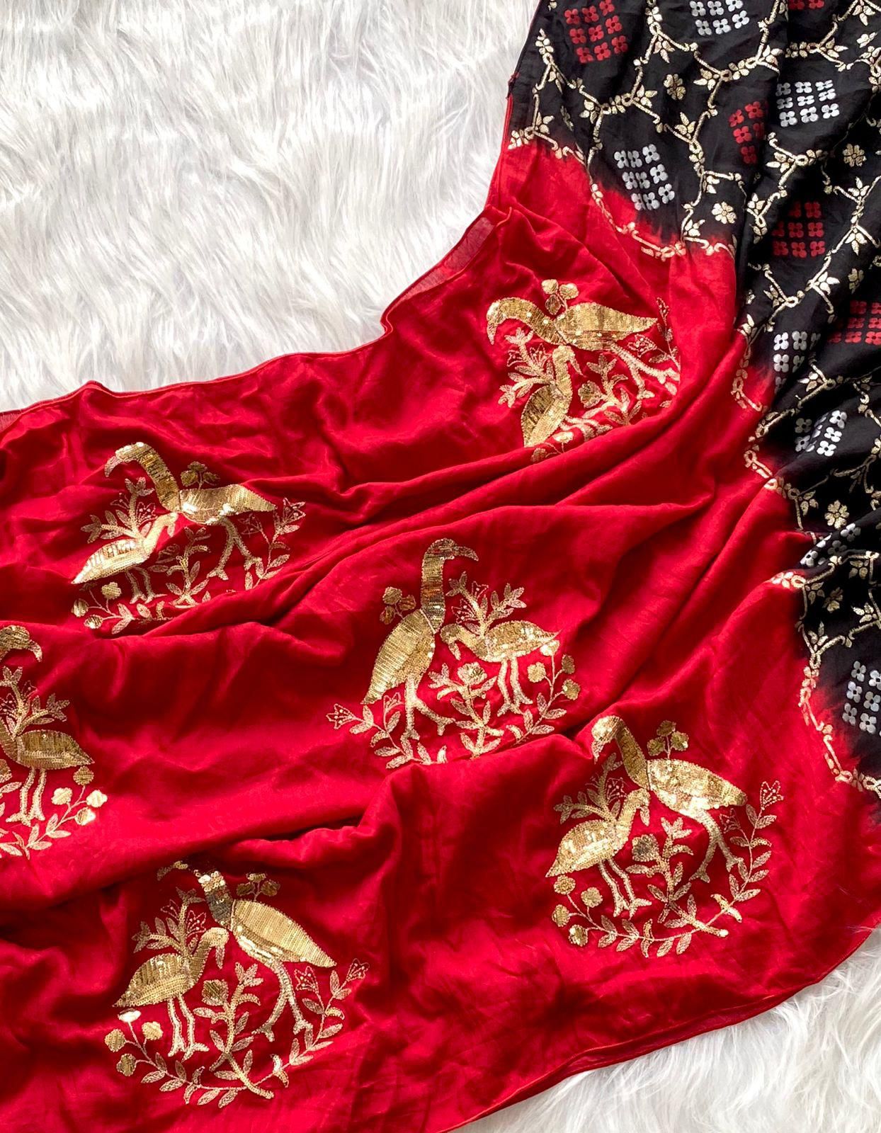 Cynosure Red Sequence Work Georgette Saree With Stunner Blouse Piece