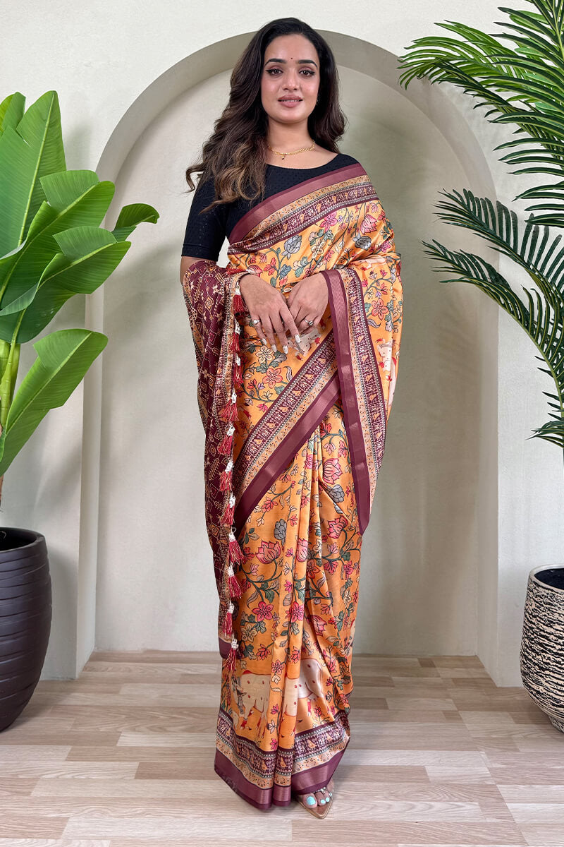 Engaging Orange Kalamkari Printed Viscose Dola Silk Saree With Artistic Blouse Piece