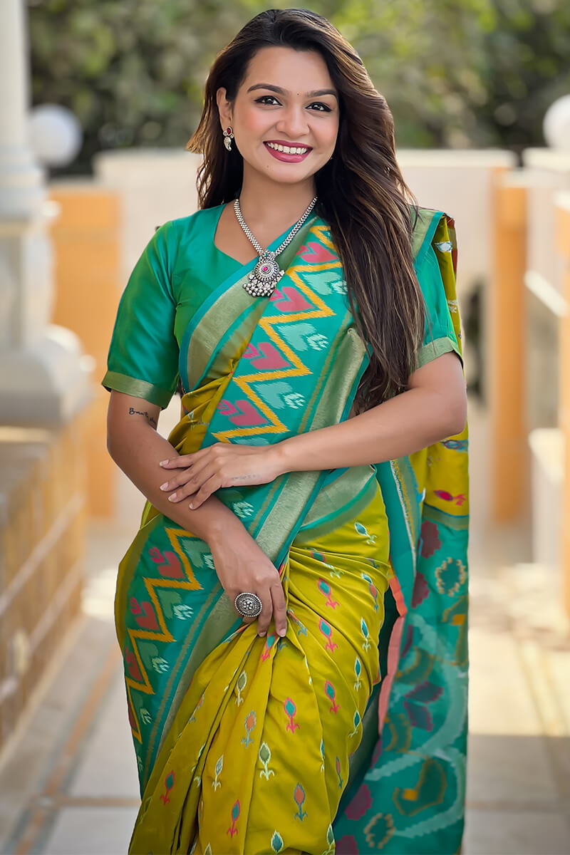 Devastating Mehndi Soft Banarasi Silk Saree With Twirling Blouse Piece