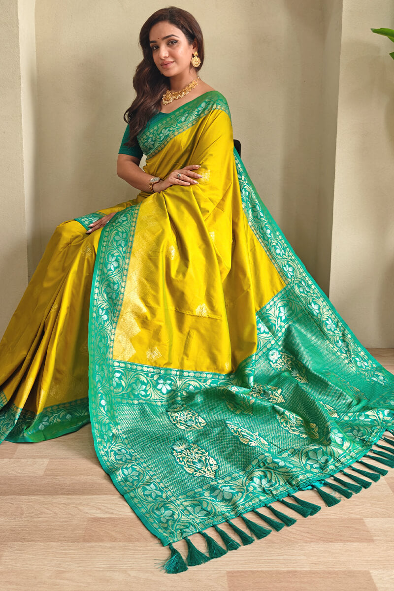 Petrichor Mustard Soft Banarasi Silk Saree With Woebegone Blouse Piece