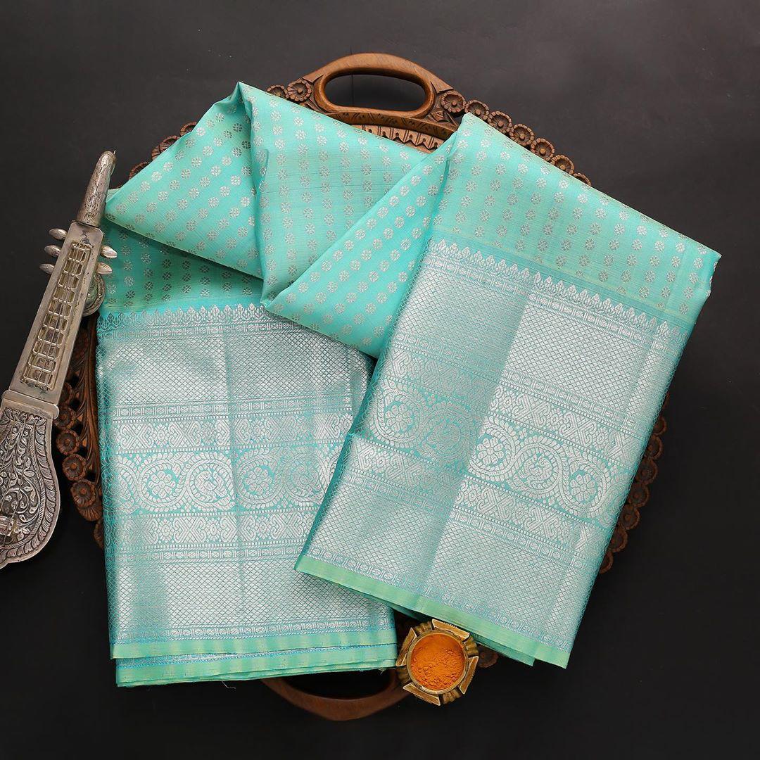 Divine Firozi Soft Silk Saree With Dalliance Blouse Piece