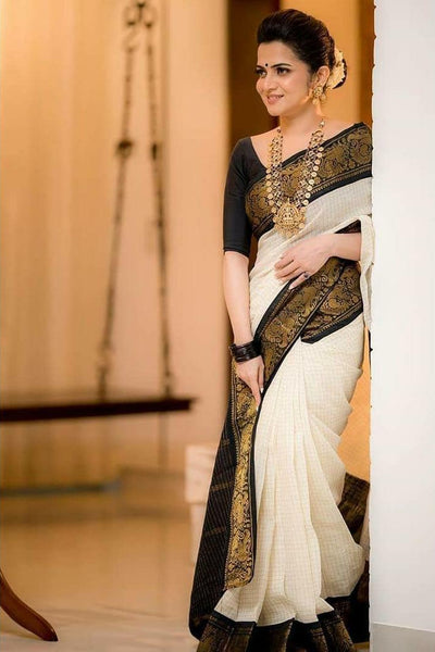 Moiety Off White Soft Banarasi Silk Saree With Panoply Blouse Piece