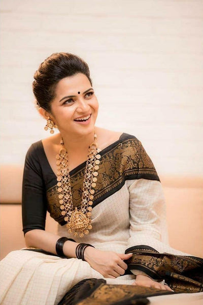 Moiety Off White Soft Banarasi Silk Saree With Panoply Blouse Piece