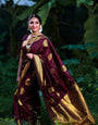 Snazzy Wine Soft Banarasi Silk Saree With Gratifying Blouse Piece