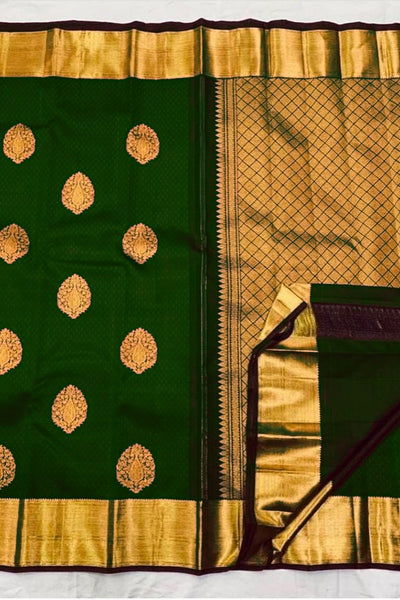 Quintessential Dark Green Soft Banarasi Silk Saree With Lissome Blouse Piece