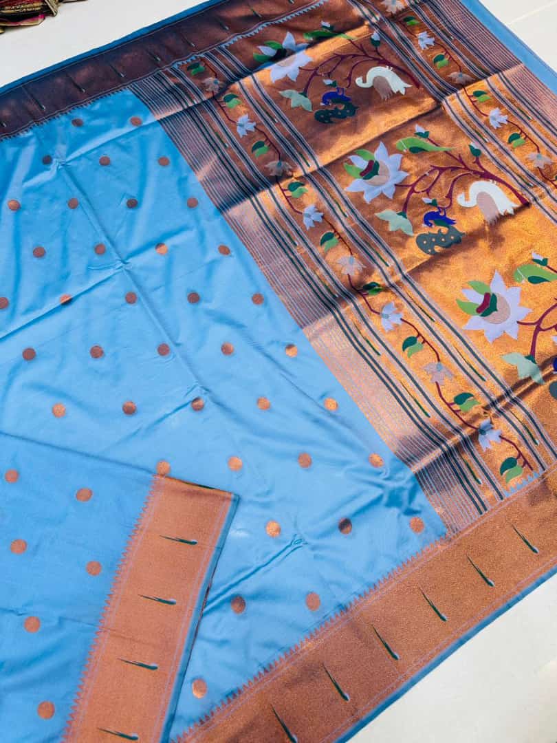 Phenomenal Sky Paithani Silk saree With Snappy Blouse Piece