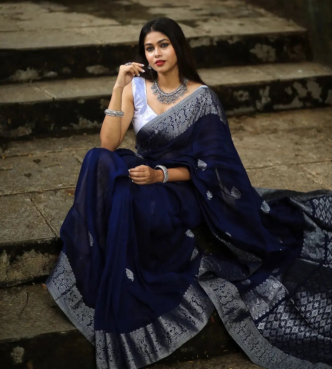 Charming Navy Blue Soft Banarasi Silk Saree With Glowing Blouse Piece
