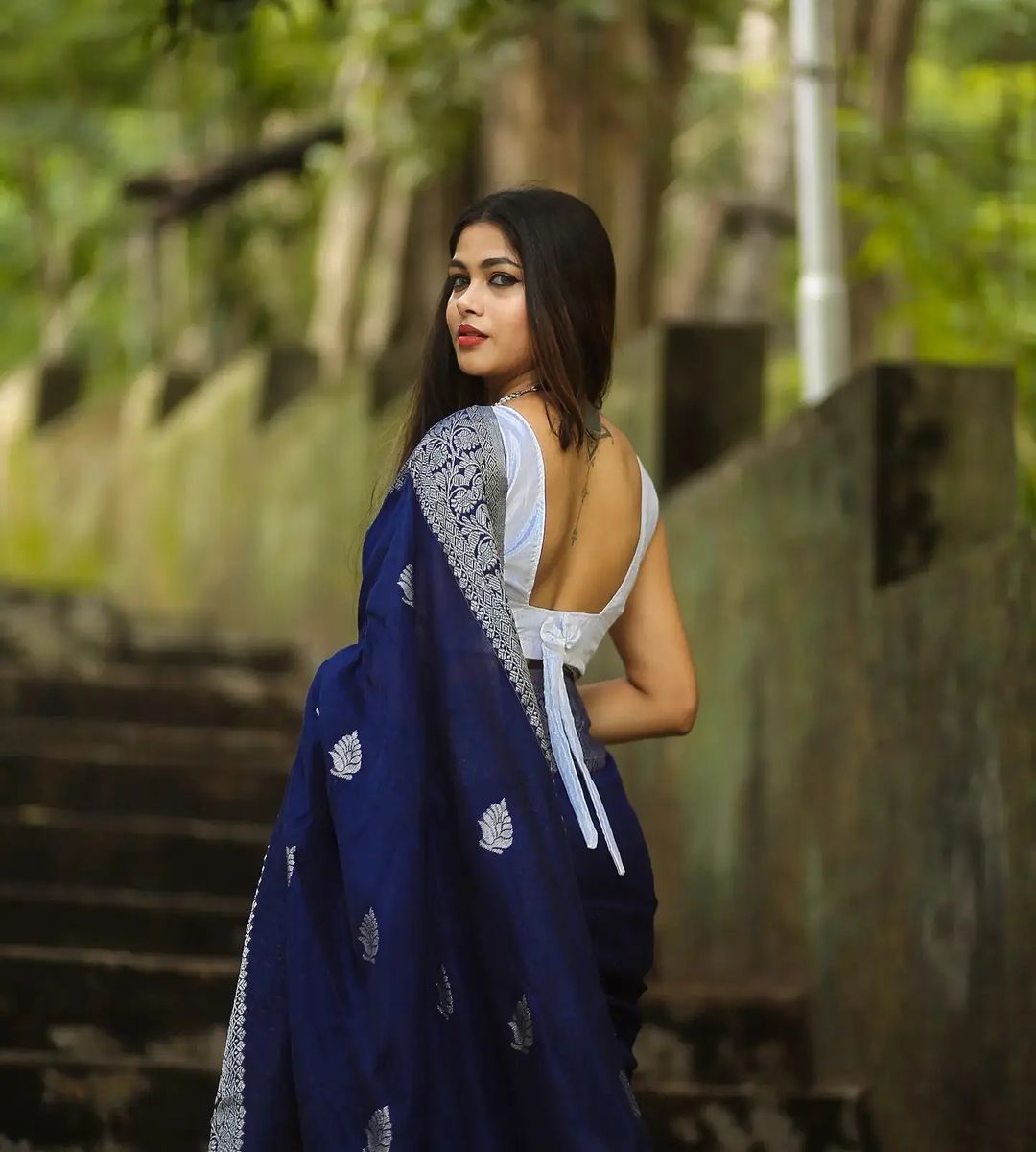Charming Navy Blue Soft Banarasi Silk Saree With Glowing Blouse Piece