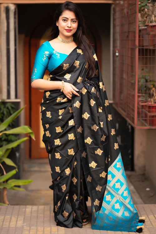 Load image into Gallery viewer, Elaborate Black and Firozi Soft Silk Saree With Piquant Blouse Piece
